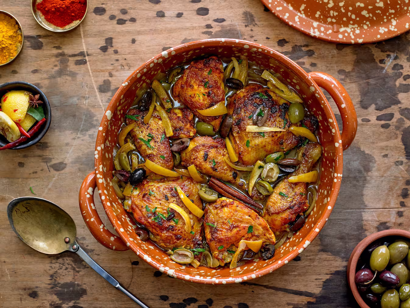Colorful and fragrant Chicken Tagine with Kalamata olives, cracked green olives, and slices of preserved lemons